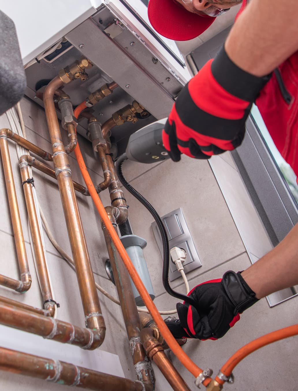 a man working on an hvac system